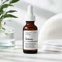 The Ordinary Caffeine Solution 5% EGCG on vanity with eye care routine