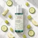Axis-Y PHA Glow Peel on surface with fruit and botanical elements