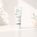 Axis-Y Sunday Morning Cleansing Foam on vanity with morning skincare routine