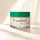 Axis-Y Dark Spot Glow Cream on vanity with brightening skincare routine